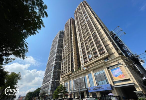 Prince Group buildings and a Prince Bank branch are seen on Norodom Boulevard in Phnom Penh after the conglomerate was sanctioned by the United States and Britain. Oct. 15, 2025. (CamboJA/Pring Samrang)